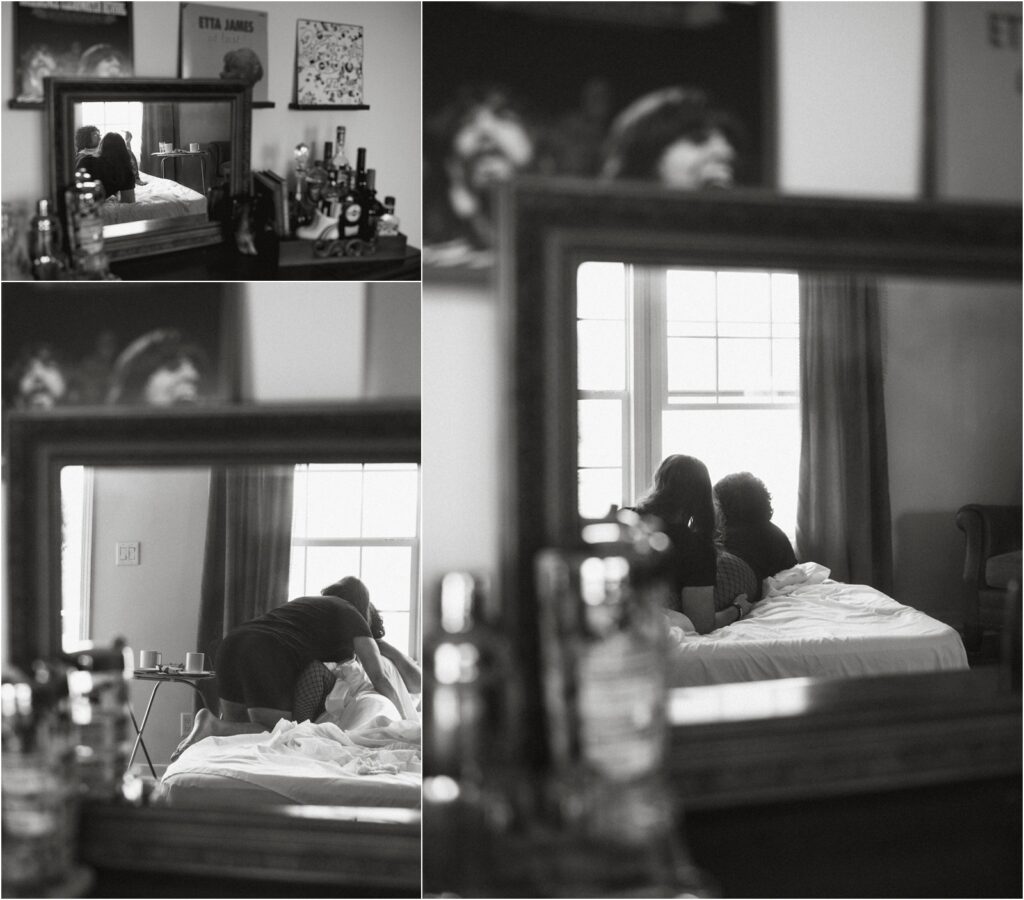 Couple's reflection in mirror during unique photoshoot session.