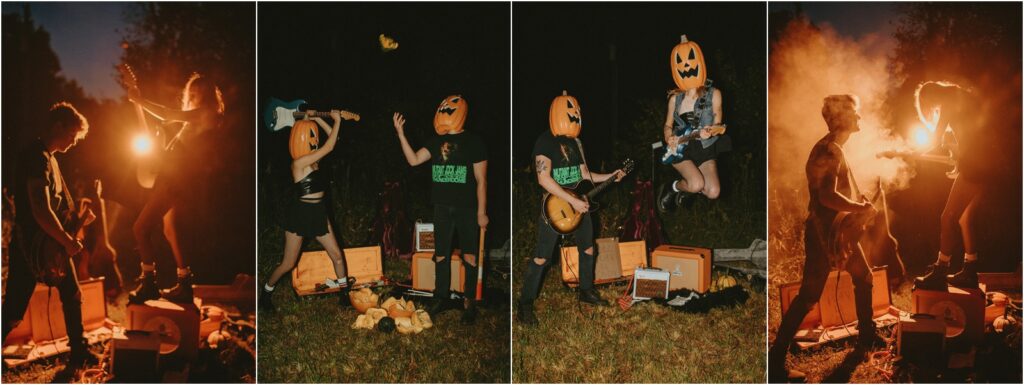 Band couple wearing pumpkin heads with guitars in front of a car's headlights.